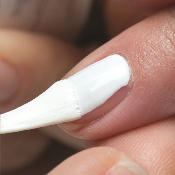 Apply a thin coat of Gelish® Arctic Freeze (White) from the cuticle to the free edge (Remember to seal the edge of the nail). Cure nails\nunder the LED 18G light for 30\nseconds or a UV light for 2 minutes.