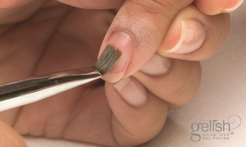 Using a #6 Gel Brush, wipe the surface of the cured Foundation Gel to remove excess tackiness. 