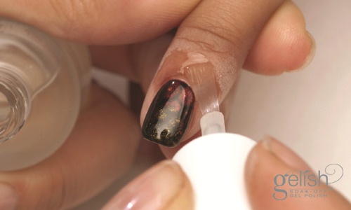 Apply Gelish Nourish Cuticle Oil and massage into the nail plate. 