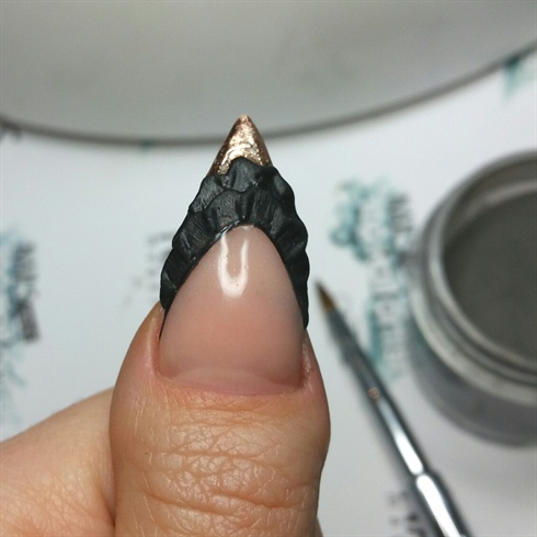 Here I added black ruffles to my thumb nail.
