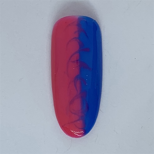 Use a dotting tool to marble the colors in alternating directions down the center of the nail.