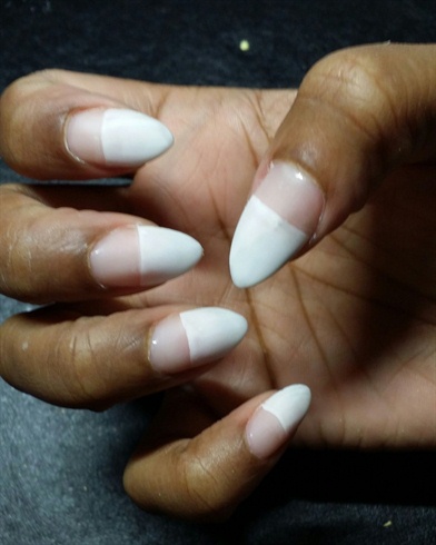 First I start with a fresh set of almond shaped nails.  I apply one coat of white gel polish midway through the nail bed.  I then top coat, cure, remove the inhibition layer and buff away the shine to prepare for the design.