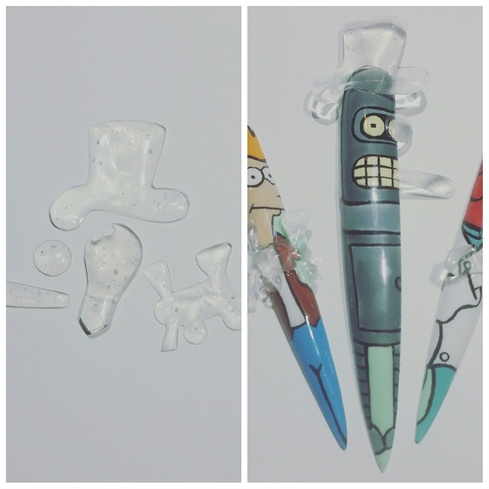 7. Then, with Akzentz gel, i sculpted various monopoly shapes and cured. For more dimension, I added more layer by layer, curing between each layer. Then I filed the edges clean. Using Akzentz Bling On! I attatched the pieces to the corresponding characters and cured.\n