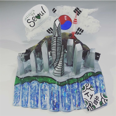 After attaching the silver cutouts, adding grass and outlining the pavement and the river, topping off with gel top coat, my work is complete ! Welcome to the new Seoul !