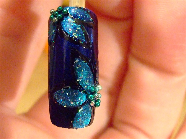 Blue shine flower nail art design