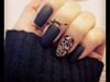 Black nail polish with gem
