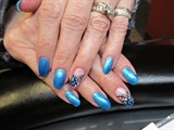 Blue and shell freehand nail art