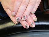 Acrylic nails with nails art and gold