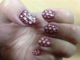 dark red base with apricot dots
