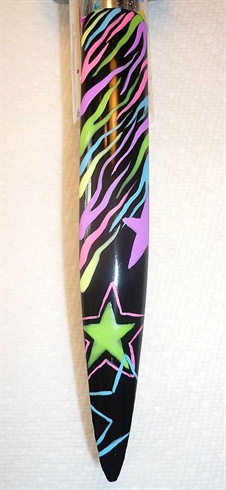 I used a prefabricated tip and painted the whole tip with black nail polish.  Once that was dry I mixed neon different colored acrylic paints with a bit of white acrylic pain to get the desired colors and hand painted the zebra stripes and stars 