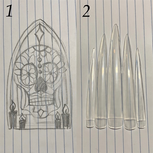 1: on a piece of paper roughly sketch out your design, this doesn't need to be perfect as it is only really for reference. \n2: for this design to be fully effective I selected long stiletto tips in different sizes to portray in shape the cathedral window. You can choose to use any sized tips, just as long as they are clear.