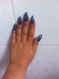 Blue and gold nail design
