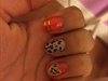 Red-orange And Cheetah Heart Nails
