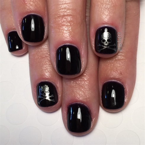 Dark Gel Manicure With Skull Accents