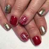 Red And Gold Snowflake Manicure