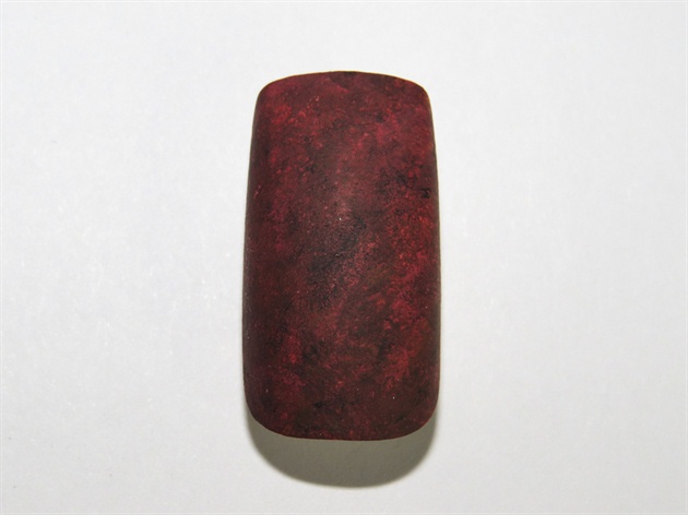 On a white nail, sponge on a mix of red, brown and black acrylic paint.