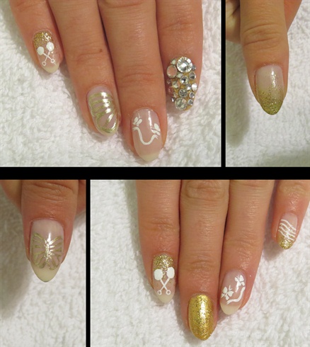 Cover the gold nails in Swarovski crystals. Paint two little butterflies holding a ribbon on one nail of each hand with white. With Locket Love by CND, paint the outline of a butterfly wing. Then with white again, paint lines for your music notes and baby rattles.