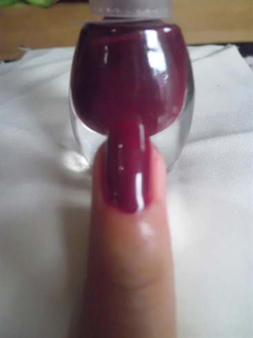 apply the maroon nail polish