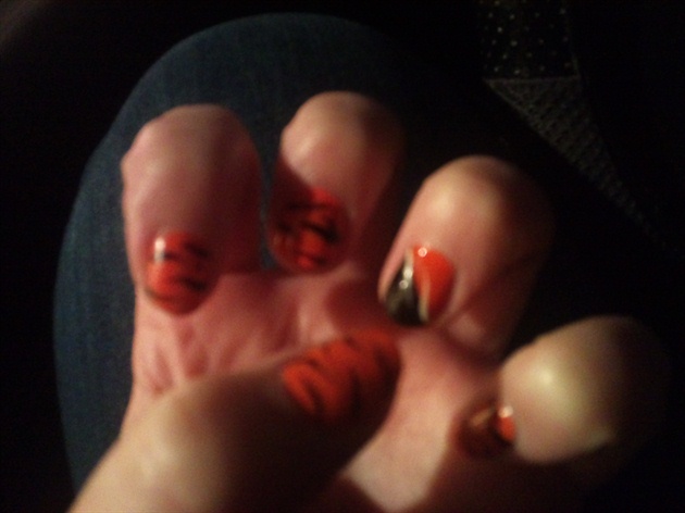 orange leopard and black nails