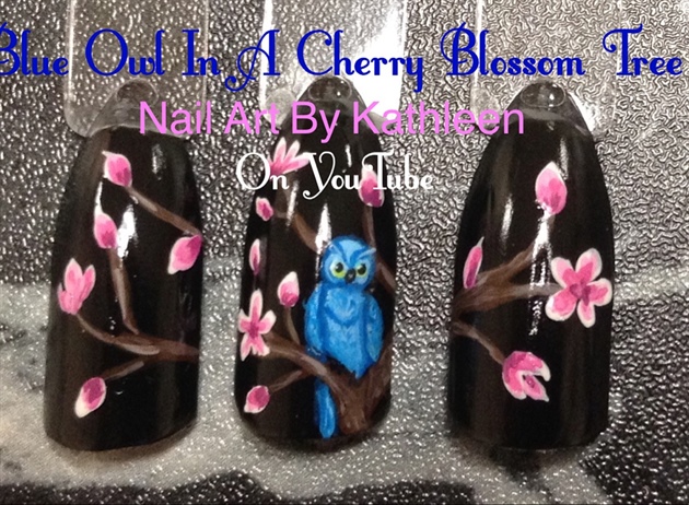 Blue Owl In A Cherry Blossom Tree