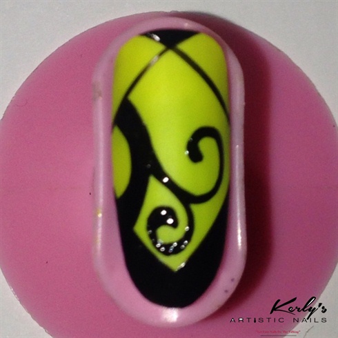 Using your nail art brush, paint a few swirls as shown above