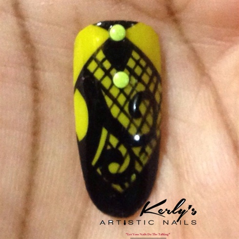 Lastly fill the blank space with a checkered print and add two neon studs of your choice as shown above