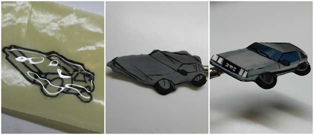 DeLorean is famous from the movie Back to the future. I created the car using hard gel, then I painted the base and the details using gel polish. Then I filed the sides. I attached the car to a spring.