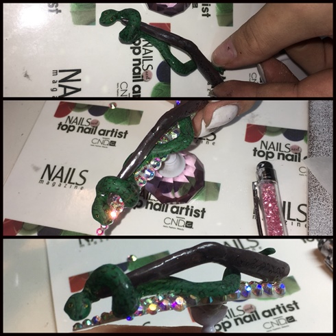 I carefully pushed the wand into the snake until it was fitting snug. I then glued it onto my Swarovski encrusted nail tip. 
