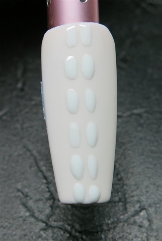 using a long detailing nail art brush paint long lines in the middle of the nail with the white gel\ndo not cure