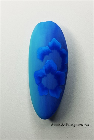 2. paint another petals in a half round shape.
