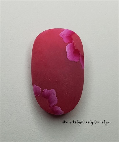 1. take off the shine from the surface with a soft buffer. Paint 3 petals in a round shape with white and pink acrylic paint. Use 2 layers if it's necessary.