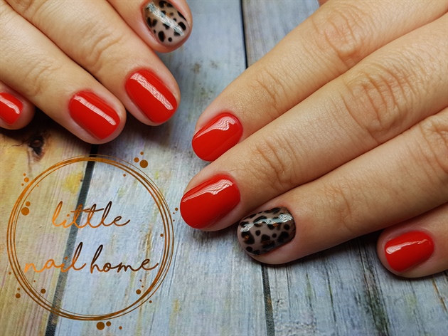 Classic red nails with a wild twist