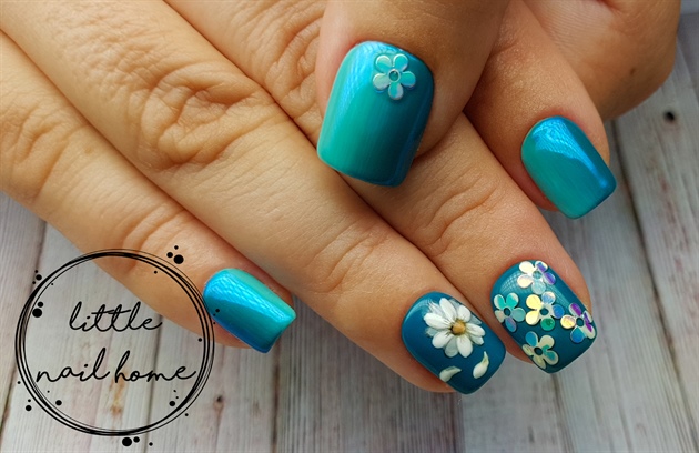 Blue ombre gel nails with flower