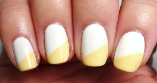 1.Apply a white base color.\n2.Use a straight nail vinyl, or nail tape to create a diagonal line across the nail, and paint the tip a light yellow.