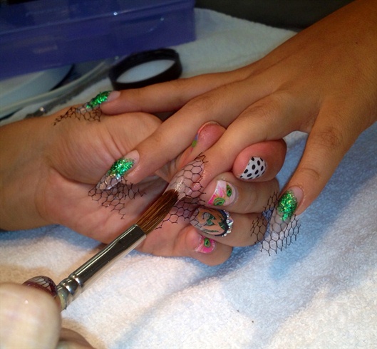 I encapsulate the nails with clear acrylic.  