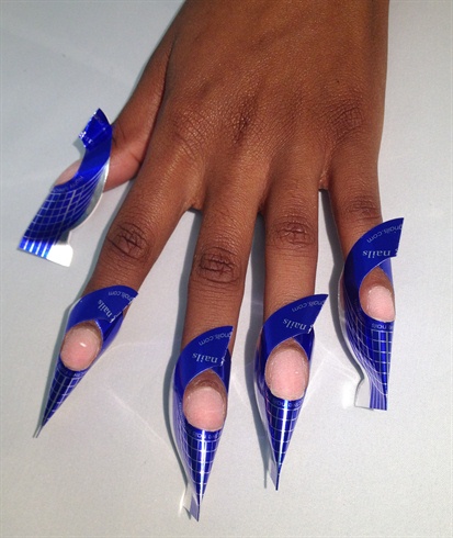 Prep and clean the natural nails and apply forms