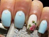 Blue Manicure with Rose Accent Nail