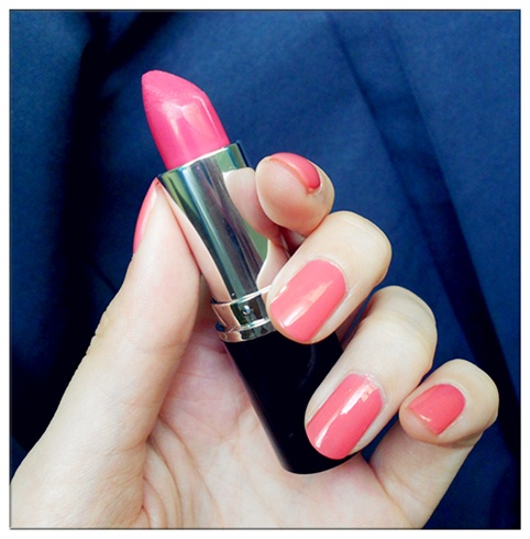 Matching pink nails and lips