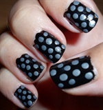 Silver dots on black background