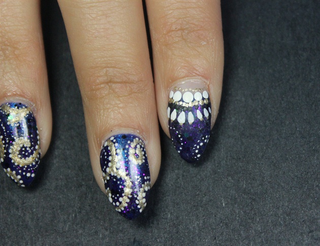 On the half moon nail, use different sized dots and some tear drop shapes to mimic the beaded neckline. 