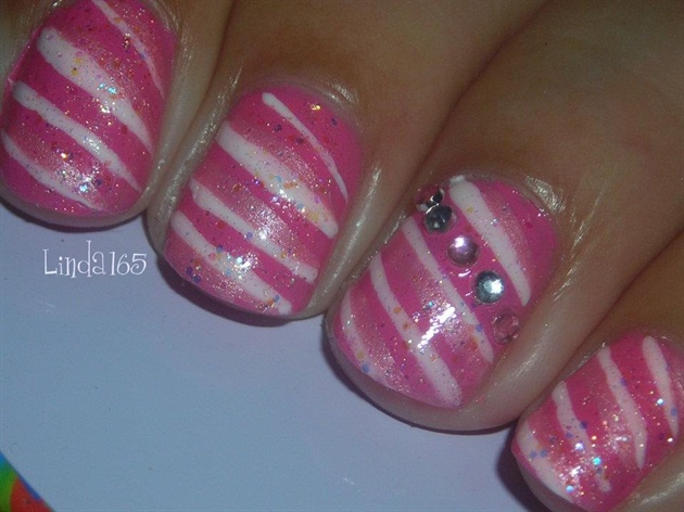 4. Sparkly Pink and White Candy Cane Nail Art Inspiration - wide 2