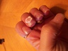 Pink glitter polish with 3D flower