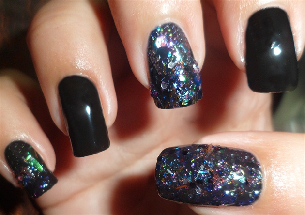 Apply a glitter nail polish or fine glitter using a clear polish on 3 nails