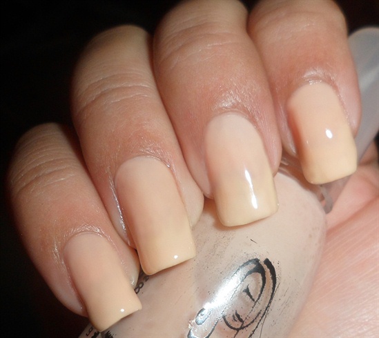 Apply base coat then paint your nails in a nude color