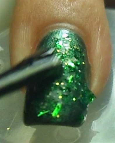 Second design, apply a green glitter mix or green glitter nail polish