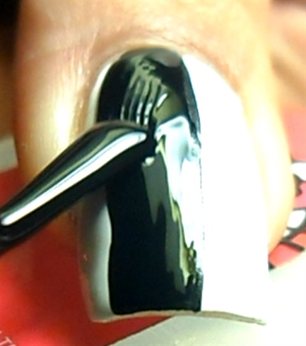 Fill in half of your nails using black nail polish