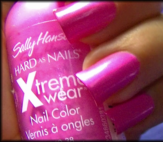 Apply base coat then paint your nails pink