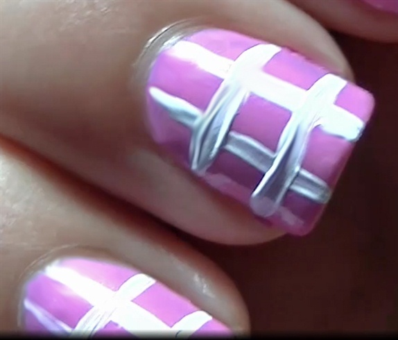 Using white acrylic paint, create a striped background like a big checkered style