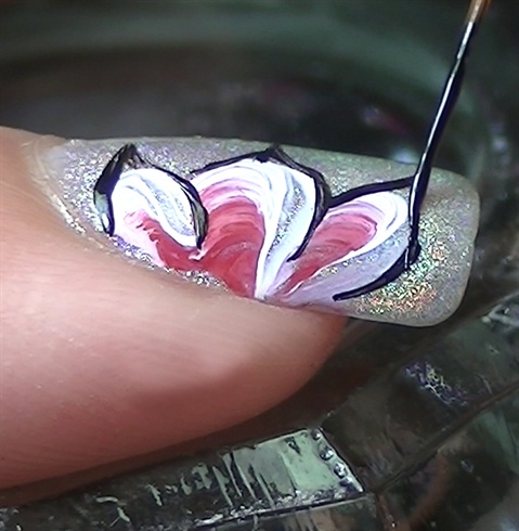 Outline the petals using black acrylic paint and a striper brush