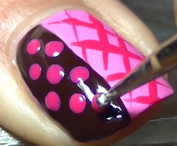Create fuchsia dots over the dark brown nail polish